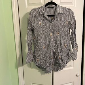 Blue and white striped button down shirt